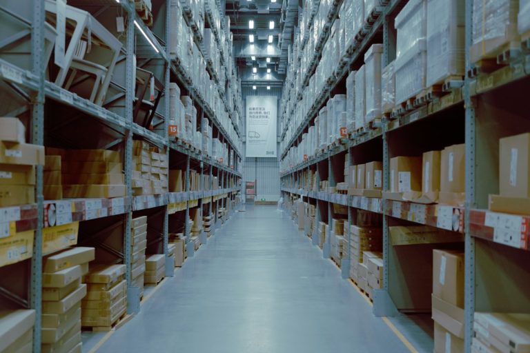 Warehouse aisle with shelves of boxes